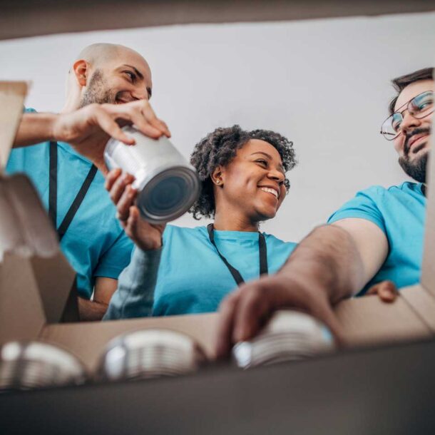 Group of professionals volunteering at a food bank