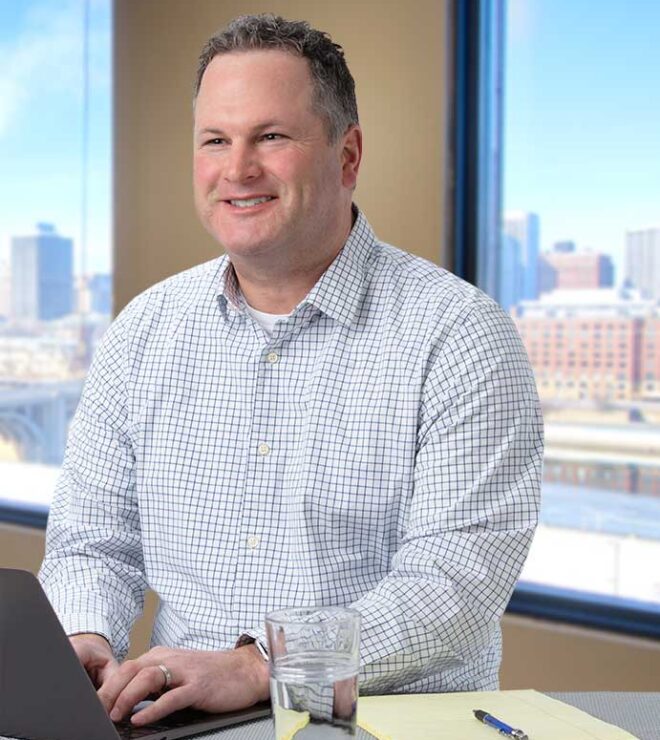 Craig Mulkay working at a computer