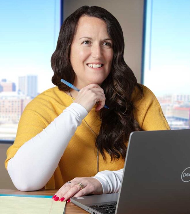 Kari Erickson working at a computer
