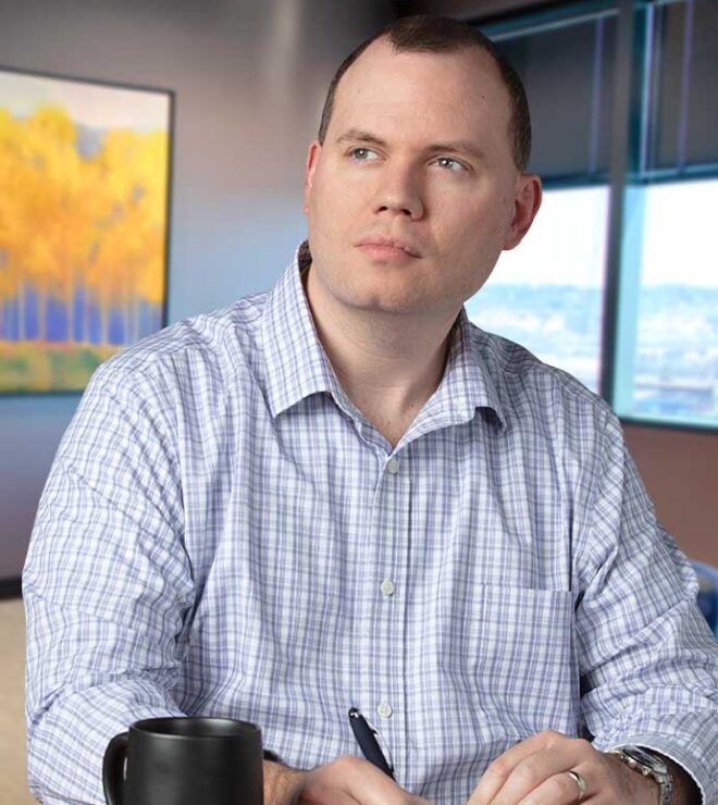 Lucas Roessier with pad and paper