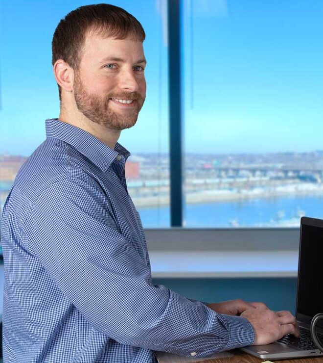 Trent Senske working at a desk