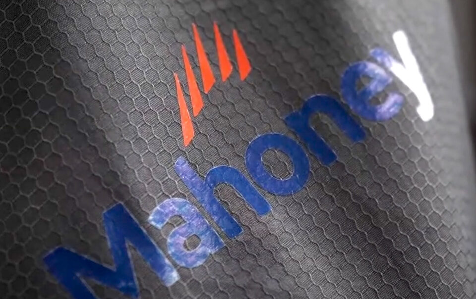 Close up of the Mahoney logo on a garment.