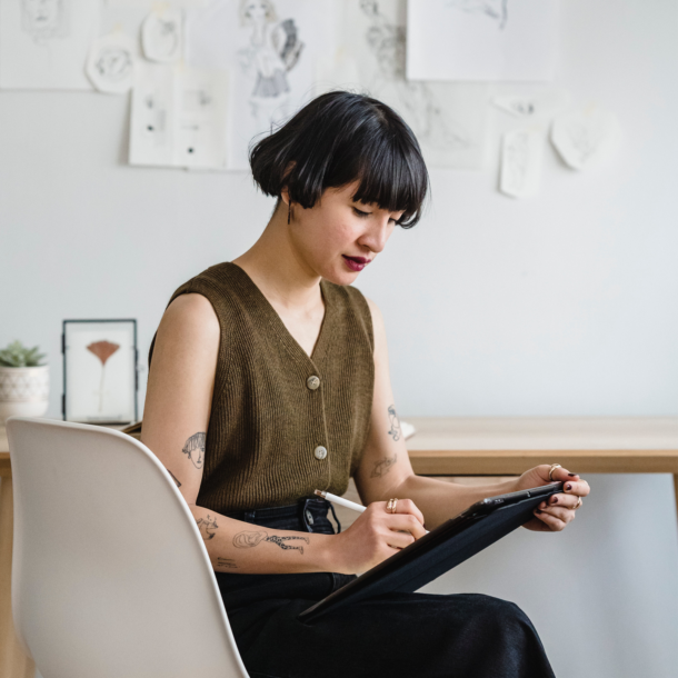 self-employed woman working on artwork