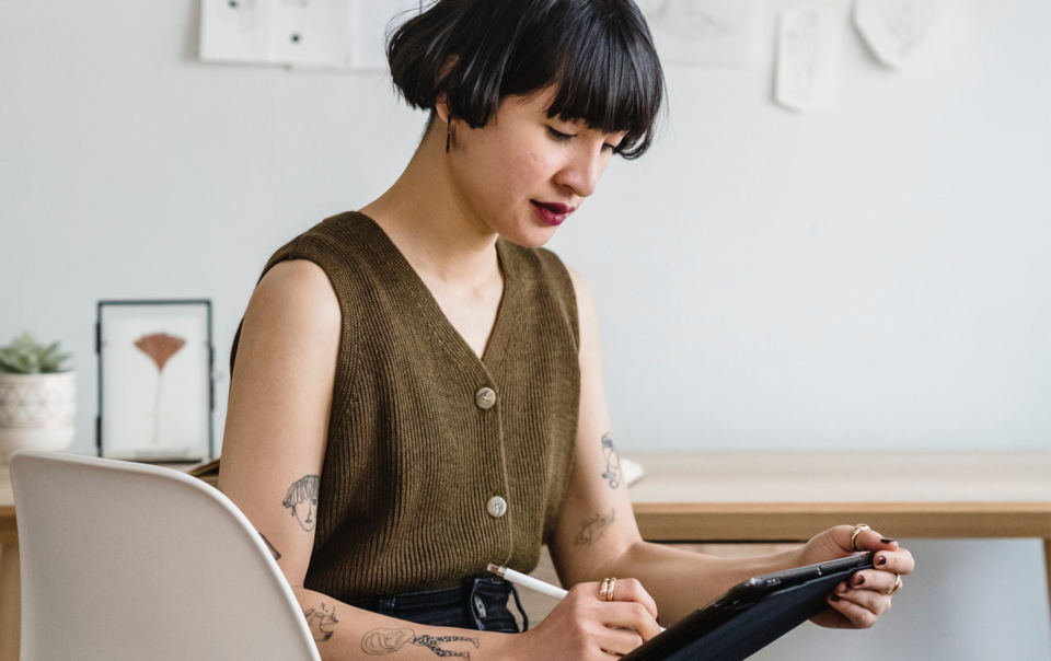 self-employed woman working on artwork